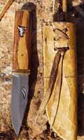 belle piece en snakewood avec crane de bison en argent massif. etui en rawhide