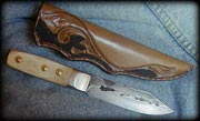32/ Small green river, American bison bone, german silver, brass pins with a hand carved sheath.