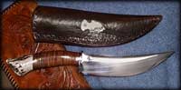 41/ Another Scagel knife. 25 cm overall, nickel silver guard, deer antler and leather.90% repro.