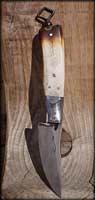 Old West patch knife. Deer stag, Nickel damascus bolster, old XIXe key as pommel. rawhide beaded sheath lined, with brass beeds, nails. blade 7.2 cm, o/a 17cm .