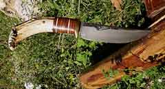 86/ Scagel knife, 80% repro. Brass guard, leather strips; brass & micarta spacers, white tail deer stag.